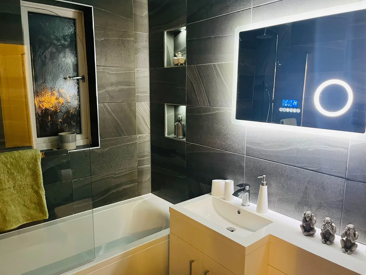 Dark bathroom finish from Doherty Plumbing and Gas work gallery